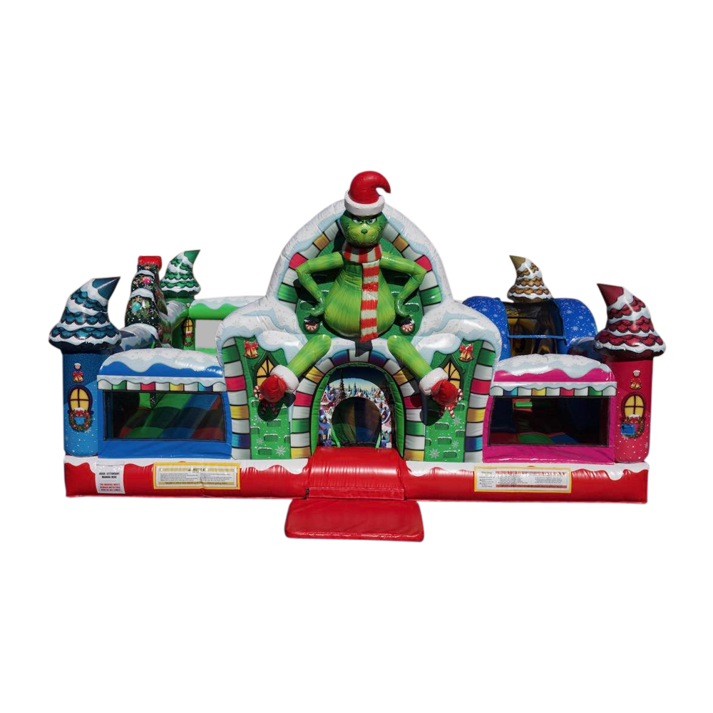 Grinch themed inflatable playland with a snowy holiday village design, colorful bounce areas, and a large Grinch character centerpiece.